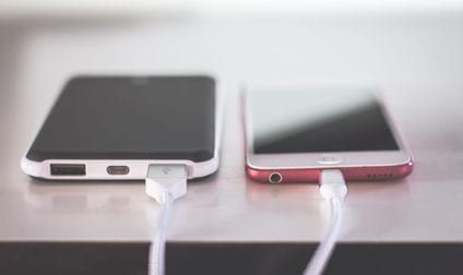 Mobile application screens being tested on physical devices